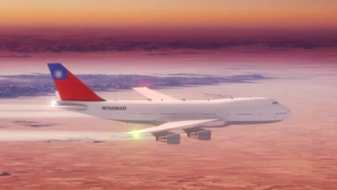 Passanger Plane Flying over Desert with Country Flag Myanmar Stock Footage 286334451