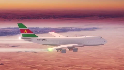 Passanger Plane Flying over Desert with Country Flag Suriname Видео 286334845