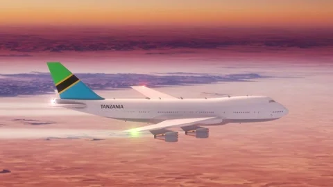 Passanger Plane Flying over Desert with Country Flag Tanzania Stock Footage 286334884
