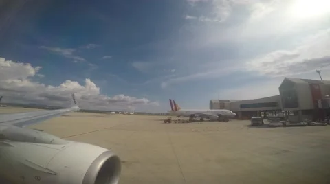 Passanger view of plane stopping at Palma De Mallorca Airport Stock Footage