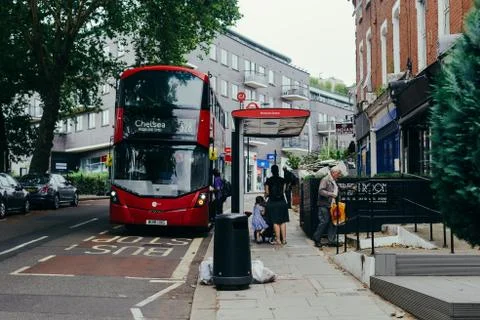 Passangers getting on a bus 스톡 사진