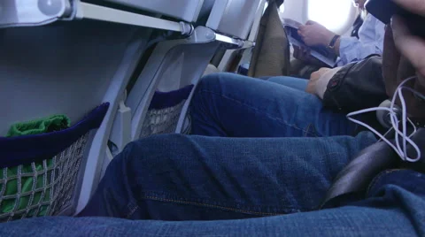 Passangers sitting airplane Stock Footage 68953636