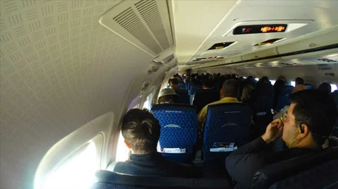 Passangers unloading plane after it lands Stock Footage 37715832