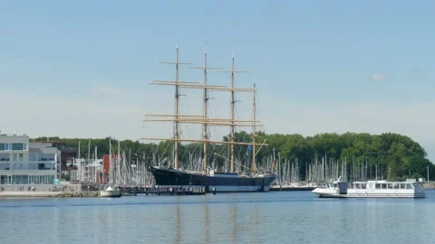 Passat sailing training ship with river Trave and Priwall ferry, Travemünde, L Video stock 132879797