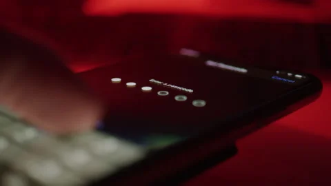 Passcode Being Entered Into a Phone Video stock 219571169