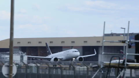 Passenger Aircraft Approaching Heathrow as Plane Spotter Films Stock Footage 342780881