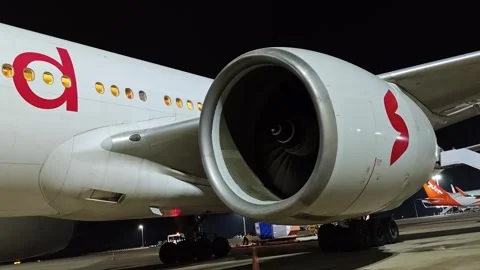Passenger aircraft with engine turbine running on airport tarmac. Stock Footage 331235161
