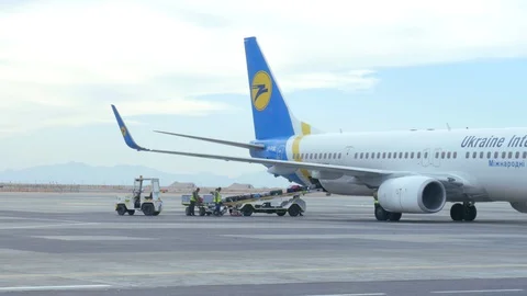 Passenger Aircraft is on Loading Stock Footage 128927332