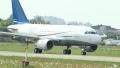 Passenger airliner take-off, day time, aircraft speeds up, flies HD Footage