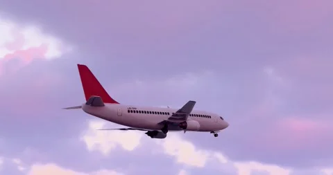 Passenger airliner taking off in the evening Видео 328364145