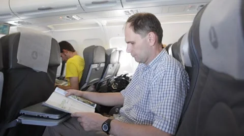 Passenger in airplaine Stock Footage 8600749