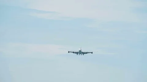 Passenger airplane approaching an airport Stock Footage