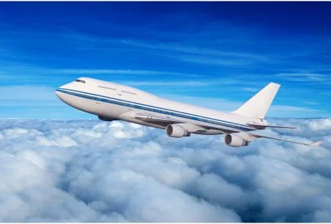 Passenger airplane in the clouds Foto stock