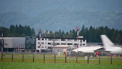 Passenger airplane passing by on the runway Stock Footage 173595103