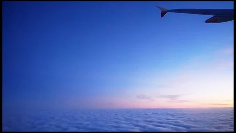 Passenger airplane sunset dusk Stock Footage 99445355
