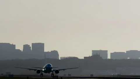 Passenger airplane taking off from runway Stock Footage 288704615