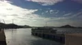 Passenger Boat Leaves Dock At Harbor Mountain Island At Sunset Beautiful Sky 4k or 4k+ Resolution