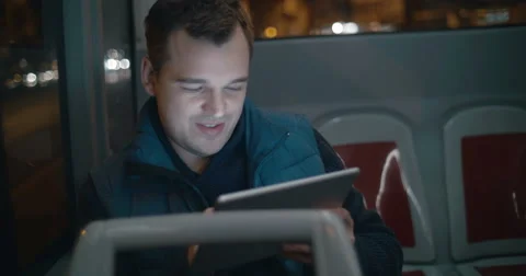 Passenger in the bus working with touch pad Stock Footage 51663046