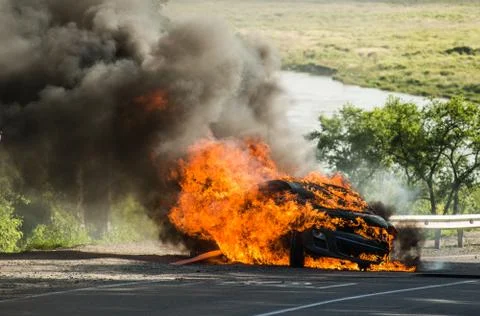 Passenger car in a fire Stock Photos