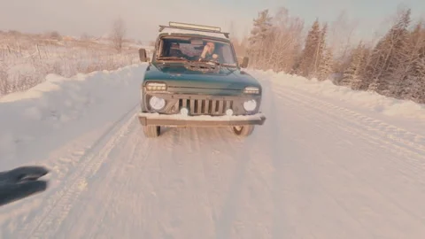 A passenger car purposefully knocks down a guy on the road. Stock Footage 325717612