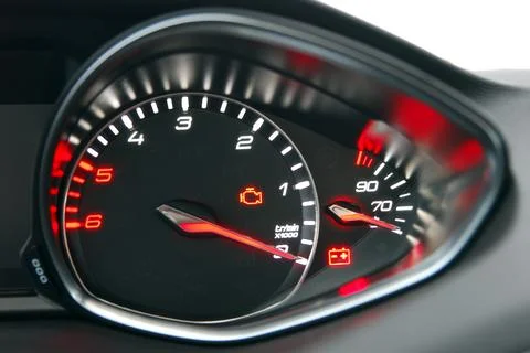 A passenger car tachometer on the instrument panel Stock Photos