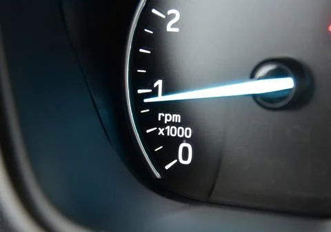 A passenger car tachometer on the instrument panel Stock Photos