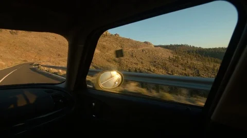 Passenger Car Taking a Sharp Right Curve in the Sunlight Stock Footage 75916549