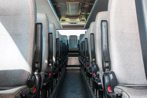 Passenger compartment of a big shuttle bus Stock Photos