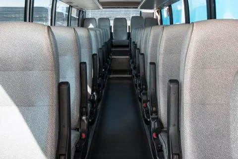 Passenger compartment of a big shuttle bus Stock Photos