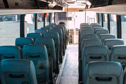 Passenger compartment of a big shuttle bus Stock Photos