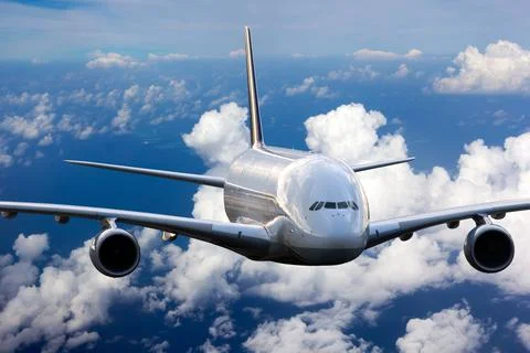 The passenger double decker plane in flight. Close Up. Stock Photos