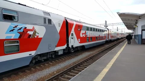 A passenger double-decker train stands at the platform at Finland Station Stock Footage 312263467