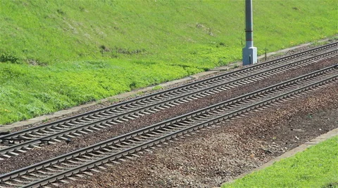 A passenger electric train passing Stock Footage 65966088