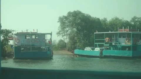 Passenger ferries navigate a quiet waterway under soft daylight, creating a Stock Footage 340193885