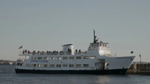 A Passenger Ferry is gracefully navigating the calm waters of a beautiful coast Vidéo 292214726