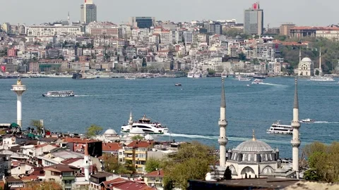 Passenger ferry sails across the Bosphorus strait in Istanbul, Turkey Stock Footage 316894499
