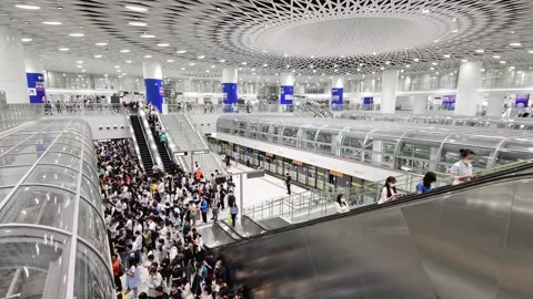Passenger Flow during Evening Rush Hour in Gangxia North of SZMC Line 11 Part AB Stock Footage 241964189
