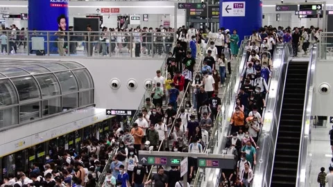 Passenger Flow during Evening Rush Hour in Gangxia North of SZMC Line 14 PartCC Stock Footage 241964976