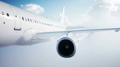 Passenger flying Plane animation. Daylight, clouds. A condensation trail of an Stockbeeldmateriaal 85496569
