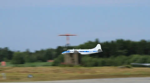 Passenger four engine propeller plane takes off Stock Footage 27532322