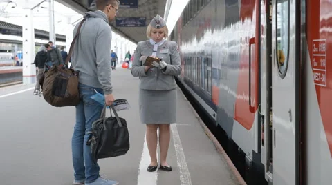 Passenger gets on the double-decker train Mikhail Ulyanov Stock-Footage 64085836