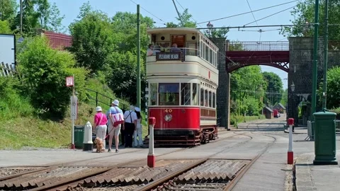 Passenger getting off a vintage tram Stock-Footage 312564320