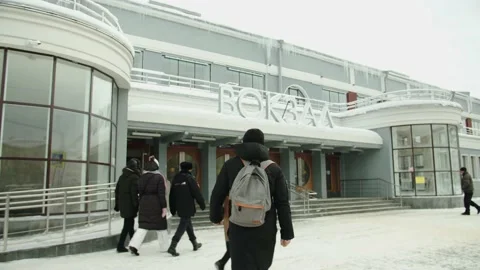 A passenger goes to the train station in winter. Stock Footage 199513586