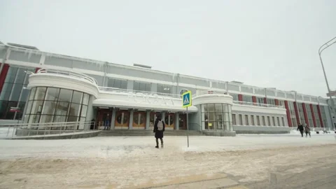 A passenger goes to the train station in winter. Stock Footage 199513927