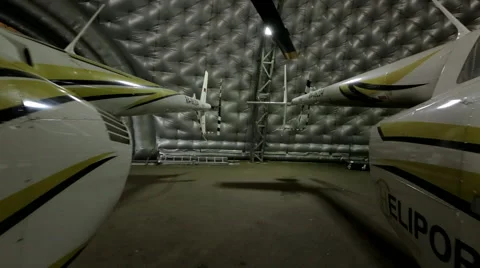 Passenger helicopter in a hangar Stock Footage 44219593