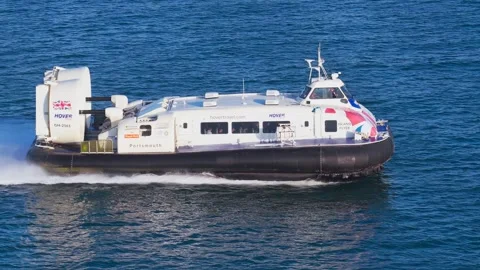 Passenger hovercraft crossing the Solent from Ryde on summer morning Stock-Footage 336240496
