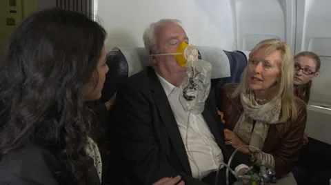 Passenger ill on plane Vídeos de archivo 56851976