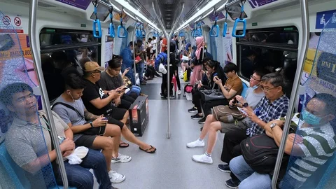 Passenger inside Mass Rapid Transit (MRT) train Stock Footage 129226164