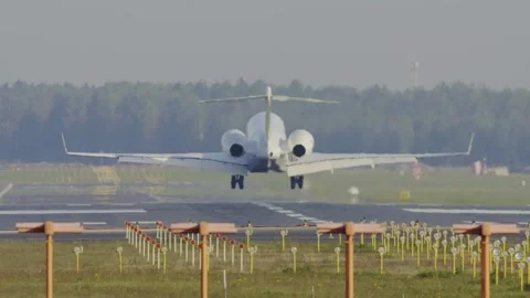 Passenger Jet Landing - Smooth Touchdown Captured with High Zoom Lens at Airport Stock-Footage 299785450
