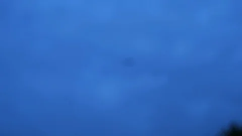 Passenger jet passing through clouds on a cold day Stock Footage 97066648